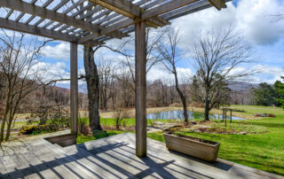 View from the Pergola Porch looking over the Rock Gardens and Front Pond -- 330 Middlemist Road
